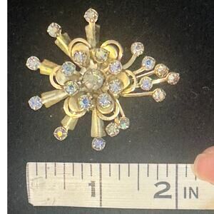 Vintage MCM brooch, gold toned with light blue rhinestones